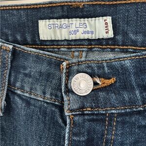 Woman’s Levi's 505 Retro Mild Stressed Denim Blue Jeans (size 8)